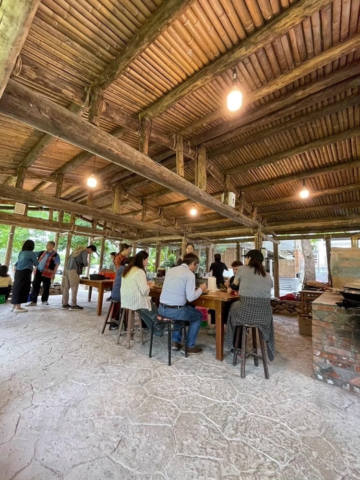 Dining in a house full of Indigenous cultural ambiance.